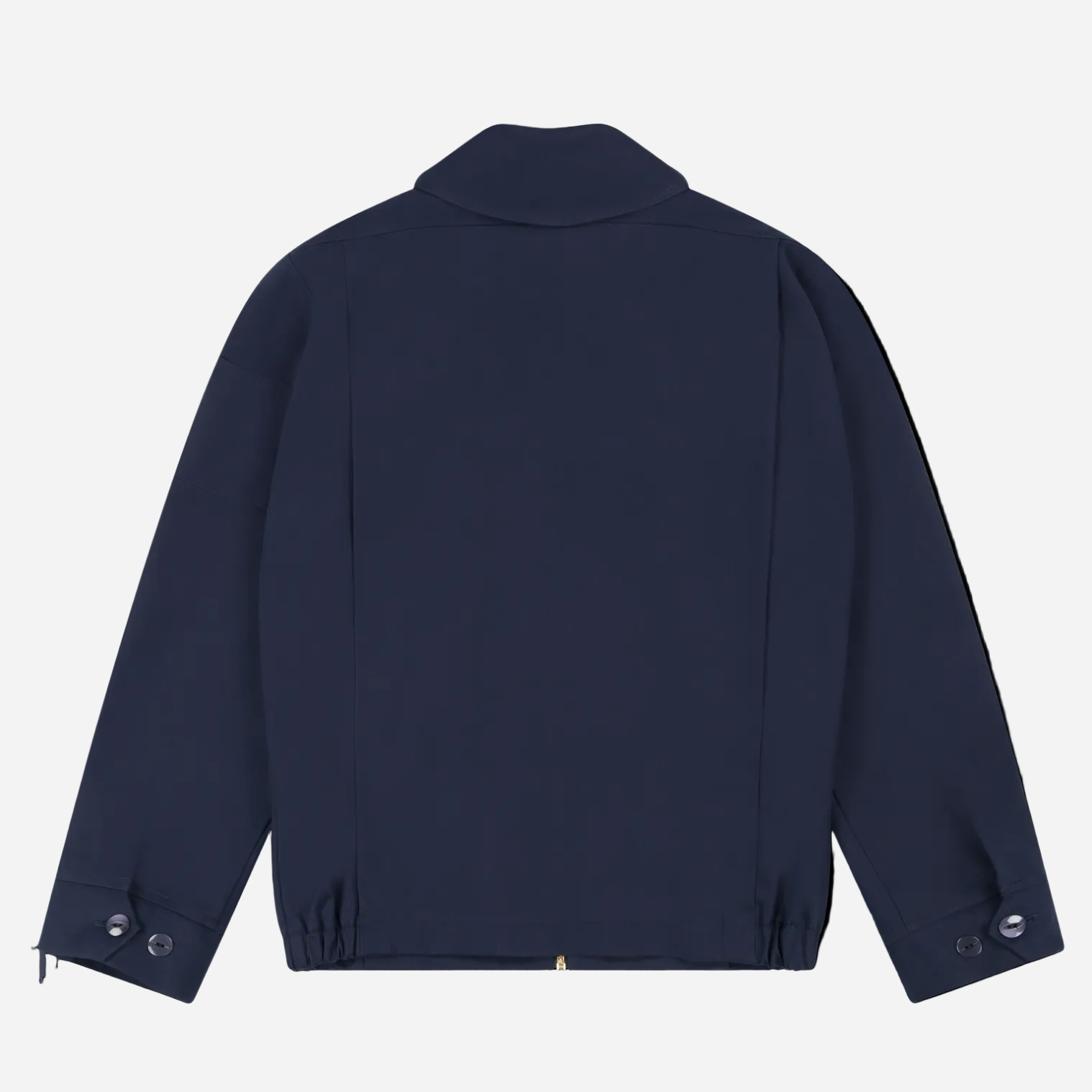 Robbyn unisex navy workwear jacket shown from the back, featuring a boxy fit, reinforced seams, adjustable buttoned cuffs, and minimal detailing.