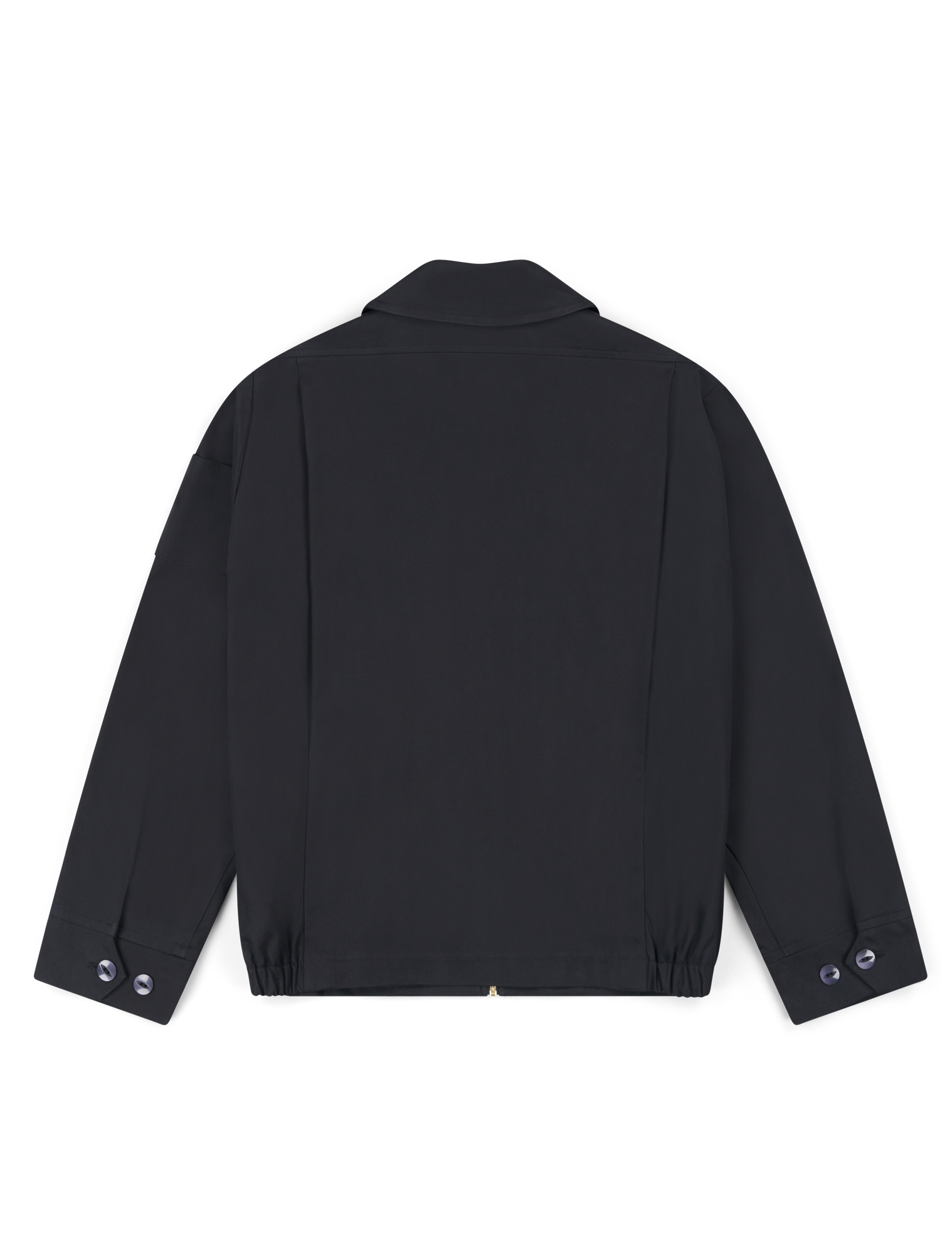 Robbyn unisex black workwear jacket shown from the back, featuring a boxy fit, reinforced seams, adjustable buttoned cuffs, and minimal detailing.