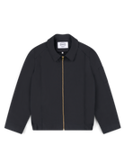 Robbyn unisex navy workwear jacket shown from the front, featuring a boxy fit, reinforced seams, adjustable buttoned cuffs, and chunky zip.