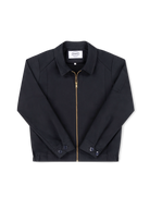 Robbyn unisex navy workwear jacket shown from the front, featuring a boxy fit, reinforced seams, adjustable buttoned cuffs, and chunky zip.